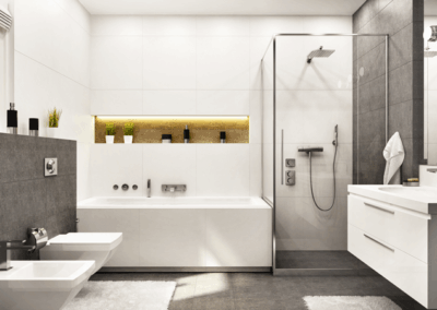 Dunkle Badezimmerfliesen mit weißen Möbeln, Badewanne, Dusche, WC und Bidet